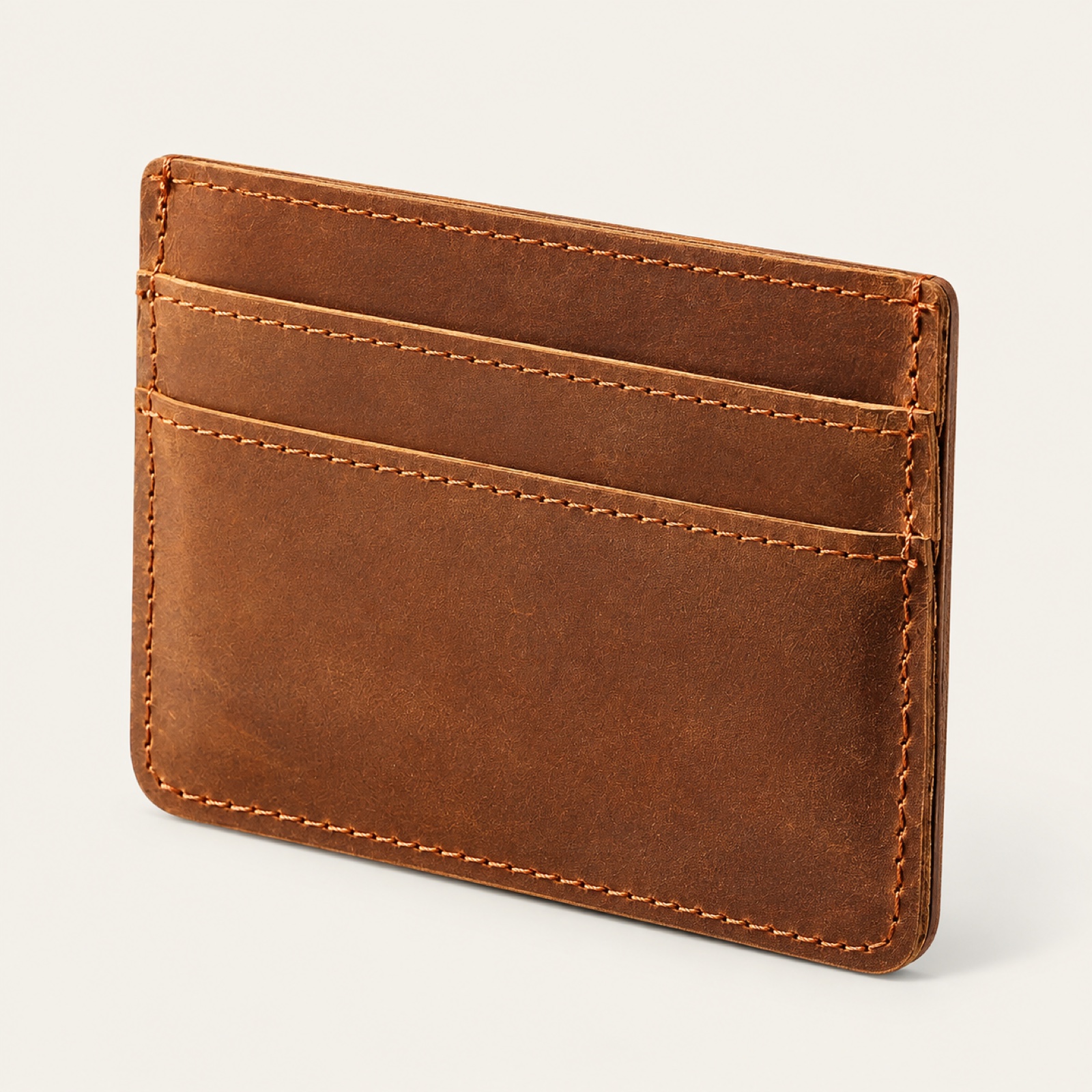 Crazy horse leather card holder in brown, front view